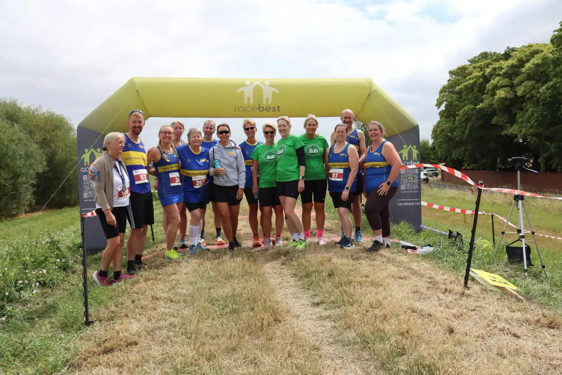 Goole Viking Striders members together under the finish arch at the Riverbank Challenge